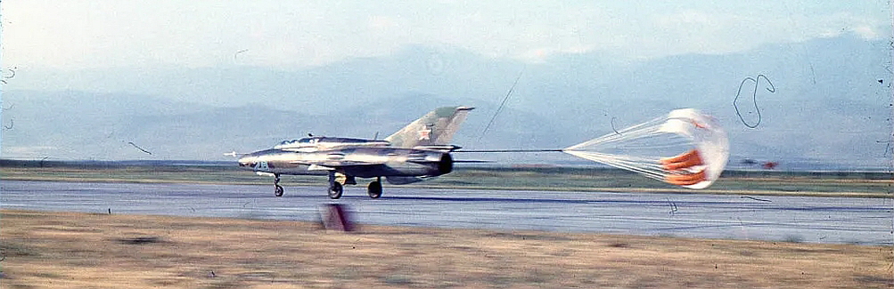 Soviet 322nd Training Aviation Regiment's MiG-21UM  landing at the Kant airport in the eighties