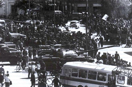 Hungarian Csepel military trucks, T-54 main battle tanks and D-442 amphibious reconnaissance vehicle with local protesters at the rsekjvr town on August 21, 1968.