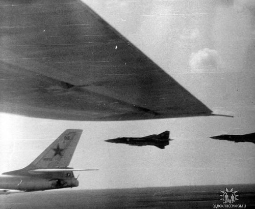 The 678th Guards Mixed Test Air Regiment's Tu-16 'Badger' and MiG-23 'Flogger' aircraft over the Kazakh desert.